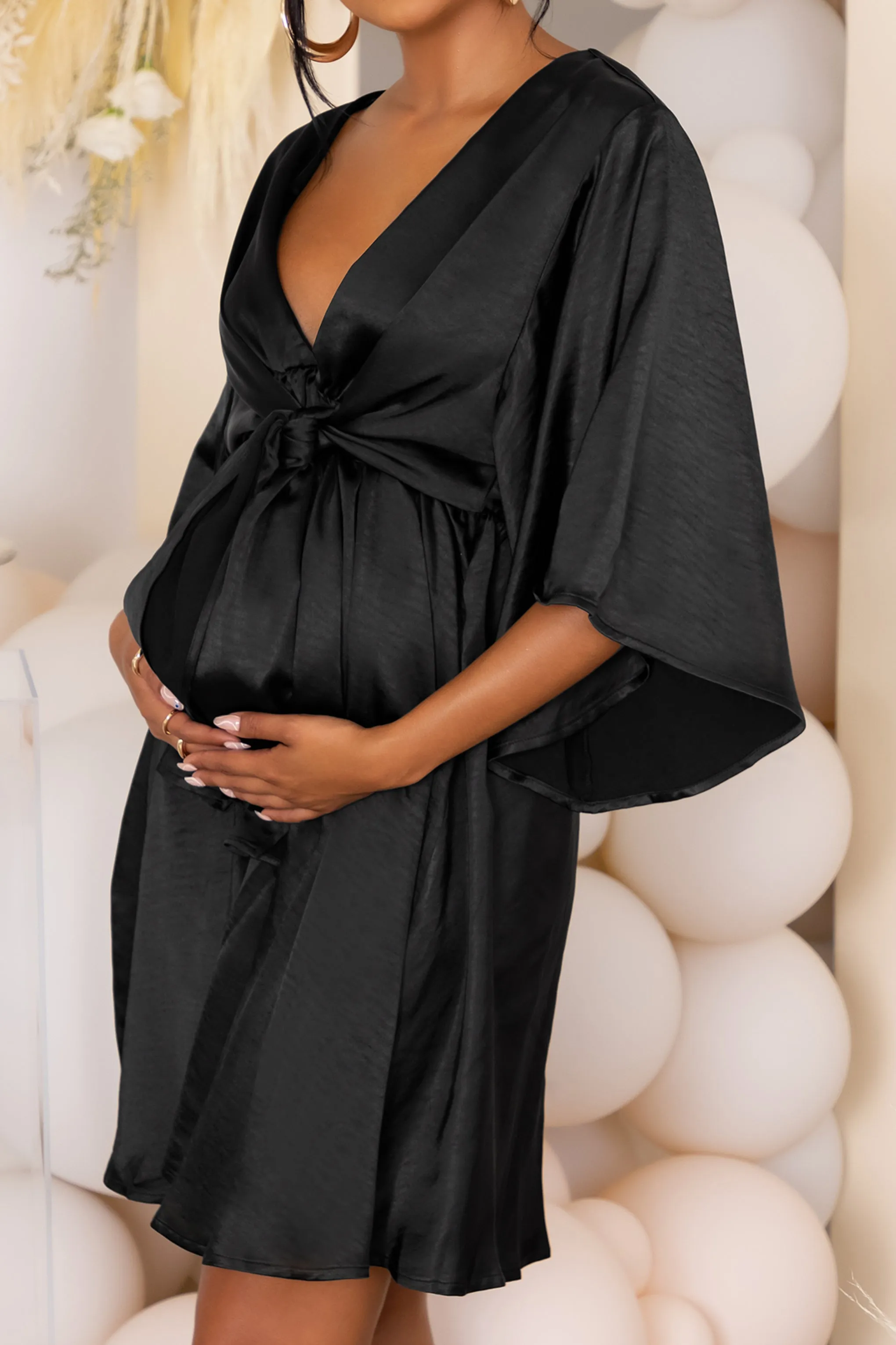 Cherub Surprise | Black Maternity Tie Front Angel Sleeve Mini Dress